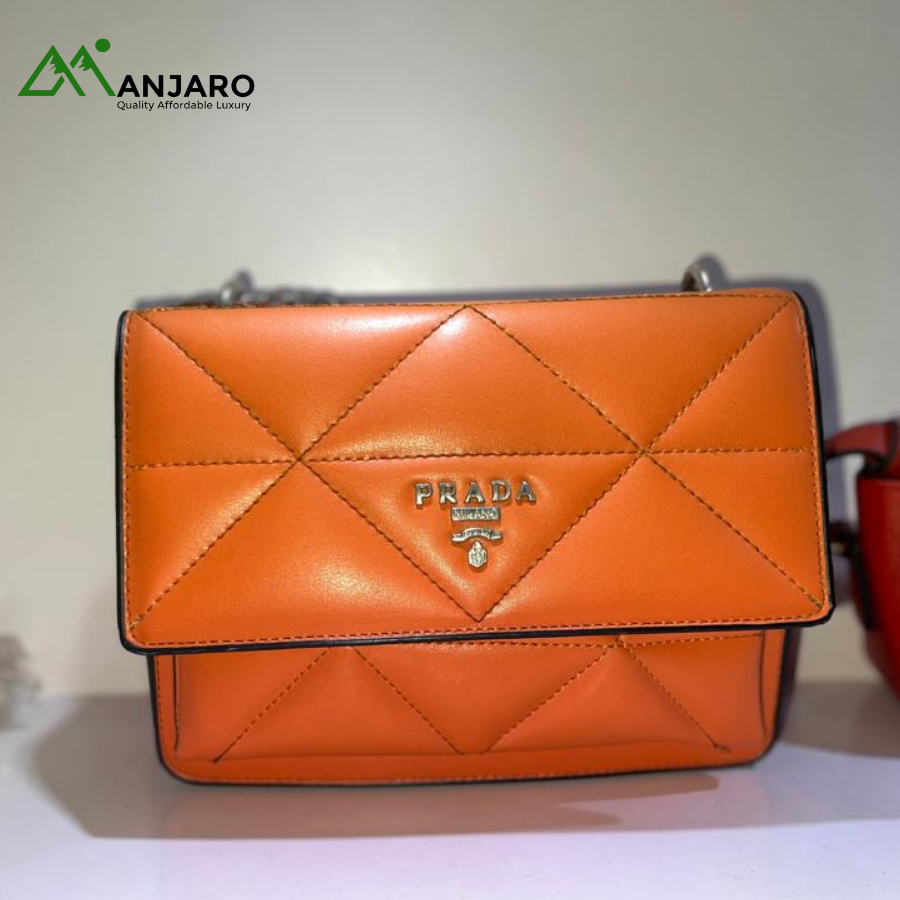 Orange Quilted Prada Shoulder Bag – Soft, Padded Luxury & Statement Crossbody