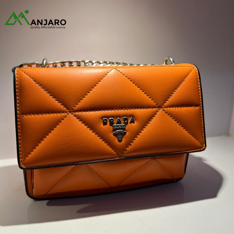 Orange Quilted Prada Shoulder Bag – Soft, Padded Luxury & Statement Crossbody